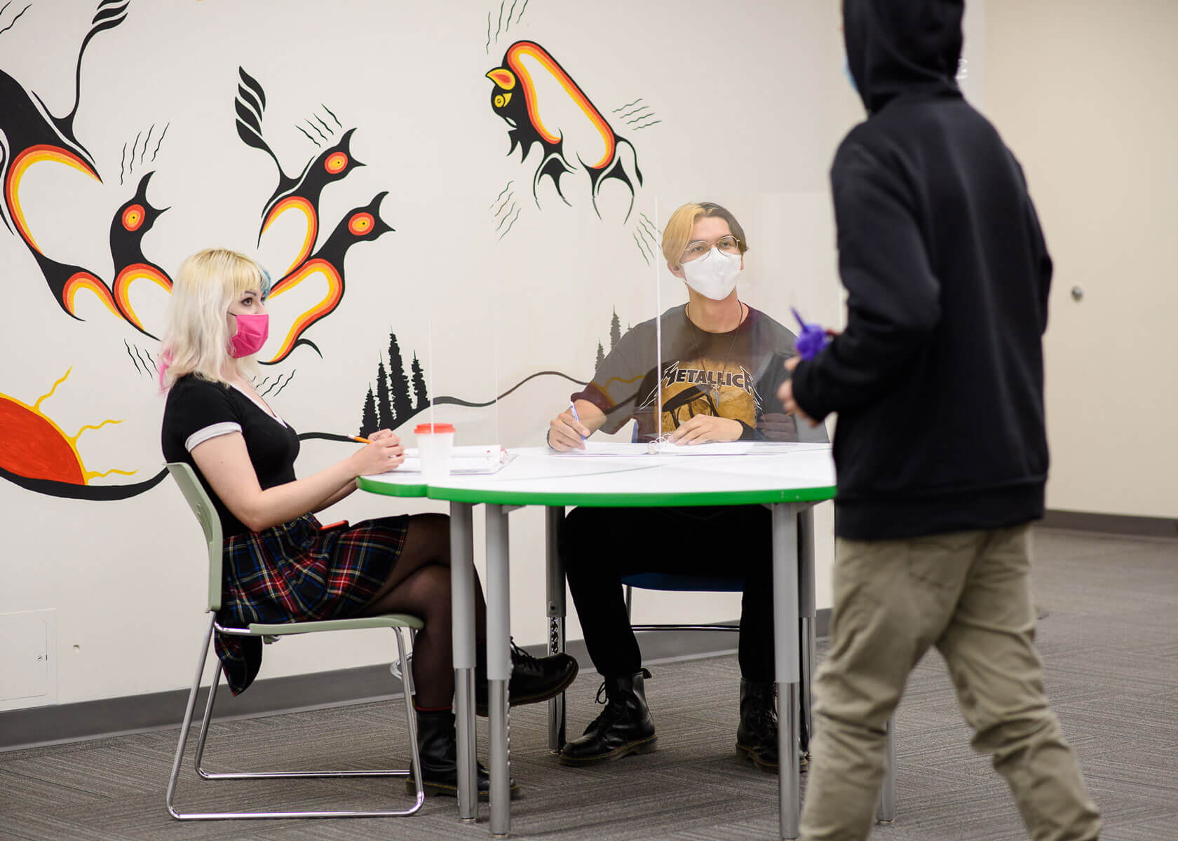 boyle-street-education-center-students-sitting-at-table-with-plastic-dividers-doing-homework-sm